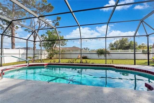 view of pool featuring a lawn and glass enclosure