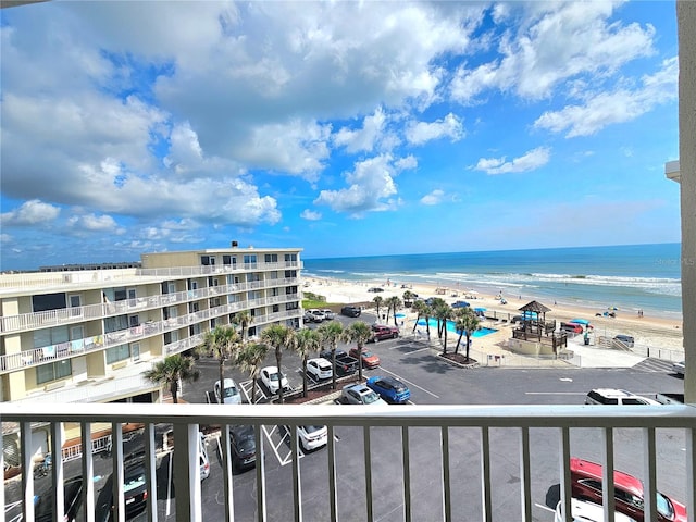 view of water feature with a beach view