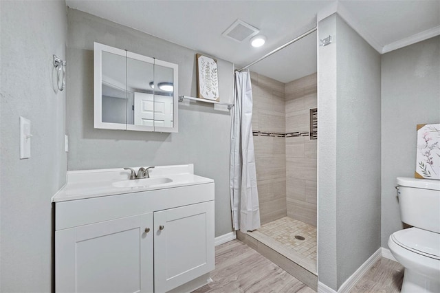 bathroom featuring walk in shower, wood-type flooring, and toilet