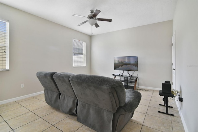 1209 Seburn Rd, Apopka, FL 32703 - living room featuring light tile patterned floors, plenty of natural light, and a ceiling fan