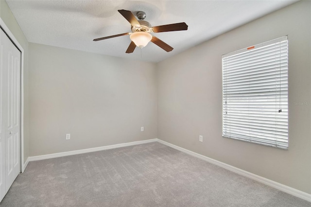 1209 Seburn Rd, Apopka, FL 32703 - unfurnished bedroom featuring a closet, carpet, and ceiling fan