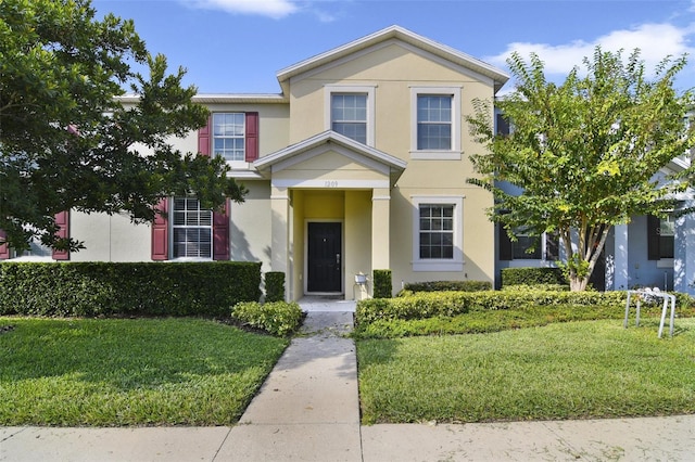 view of front facade featuring a front yard