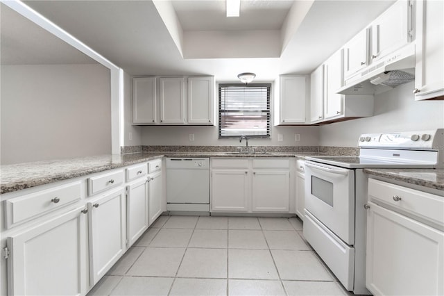 kitchen with white cabinetry and white appliances