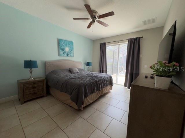 bedroom featuring visible vents, light tile patterned floors, access to outside, and a ceiling fan
