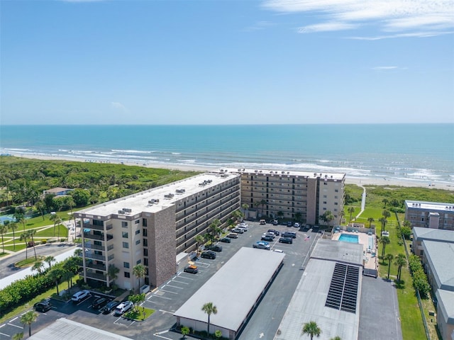 bird's eye view with a beach view and a water view