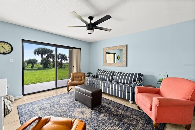 tiled living room with a textured ceiling and ceiling fan