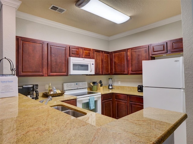 kitchen featuring light stone counters, white appliances, kitchen peninsula, a textured ceiling, and ornamental molding