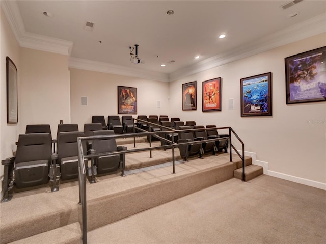 carpeted home theater room with ornamental molding