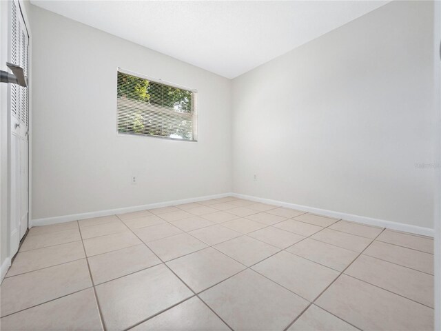 view of tiled empty room