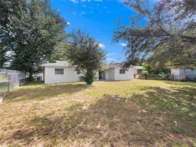 5400 Fox Briar Trl, Orlando, FL 32808 - view of yard with central air condition unit and fence