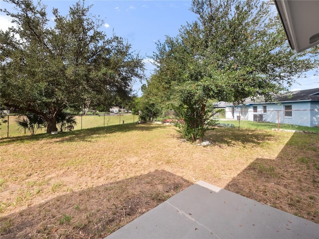 5400 Fox Briar Trl, Orlando, FL 32808 - view of yard featuring a fenced backyard