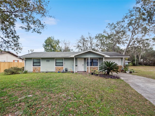 single story home with a front lawn and a garage