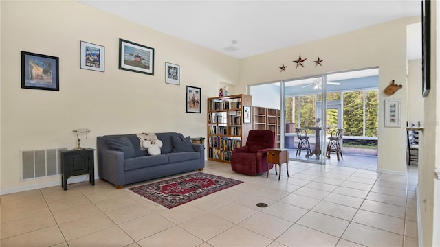 living room featuring light tile patterned flooring