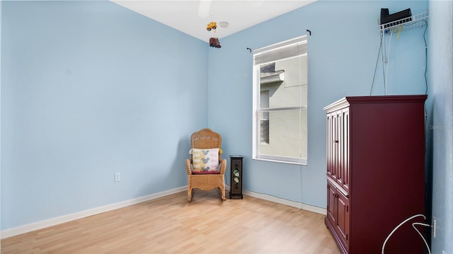 sitting room featuring light hardwood / wood-style floors