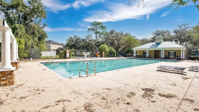 view of swimming pool featuring a patio