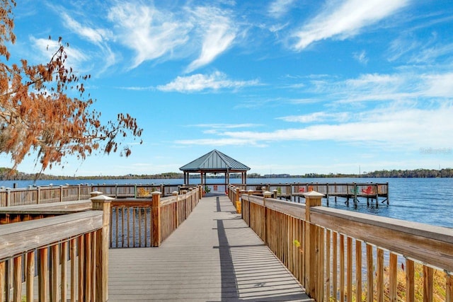 dock area featuring a gazebo and a water view