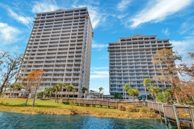 view of building exterior with a water view