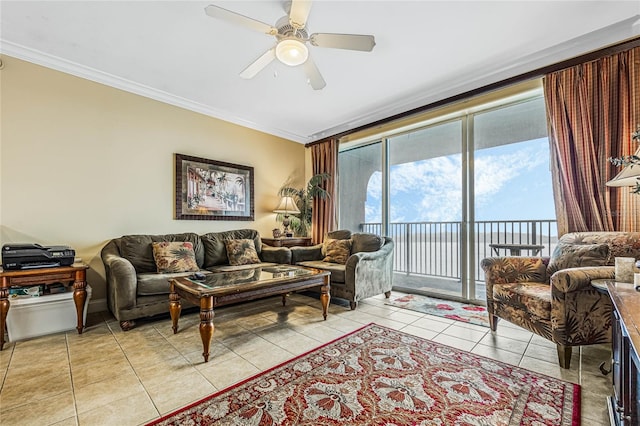 tiled living room featuring ornamental molding and ceiling fan