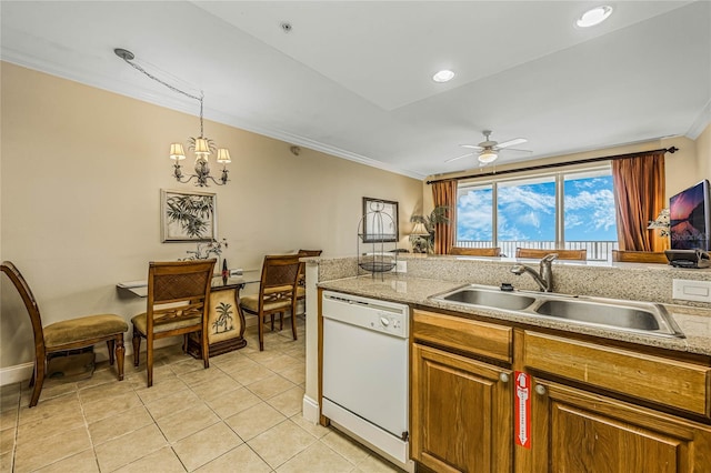 kitchen featuring pendant lighting, sink, dishwasher, ceiling fan with notable chandelier, and crown molding