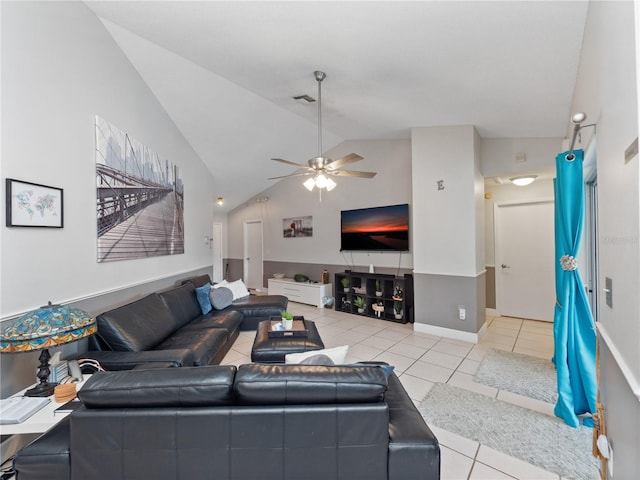 tiled living room with high vaulted ceiling and ceiling fan