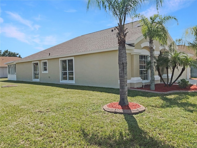 view of property exterior featuring a lawn