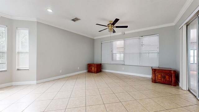 1278 Snug Harbor Dr, Casselberry, FL 32707 - empty room with a healthy amount of sunlight, ornamental molding, a ceiling fan, and visible vents