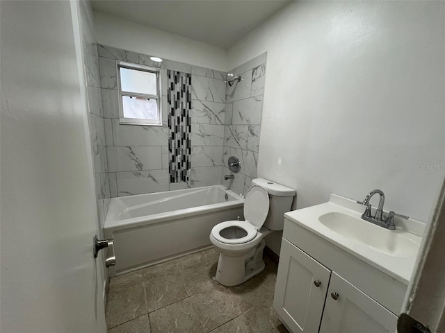 full bathroom with tiled shower / bath combo, vanity, and toilet