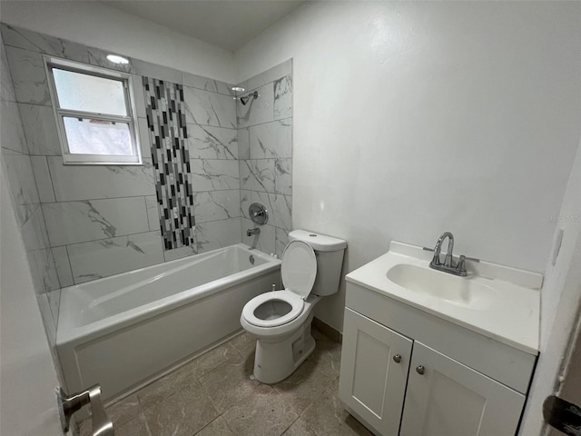 full bathroom with tiled shower / bath combo, vanity, and toilet