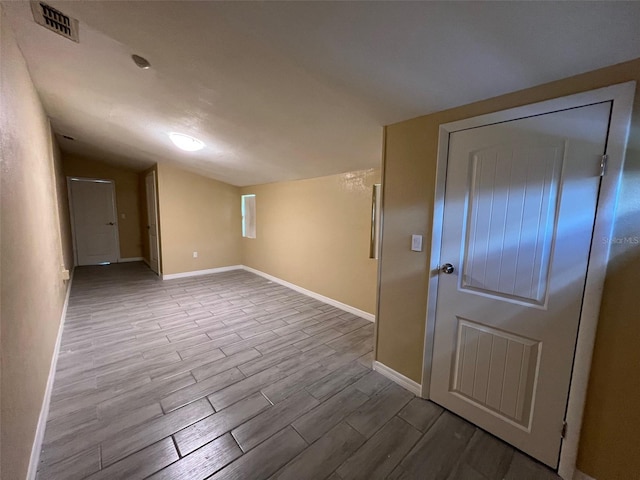 bonus room featuring light hardwood / wood-style flooring