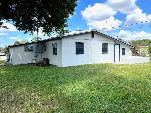 view of property exterior featuring a yard