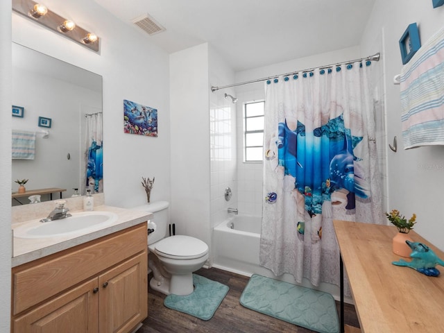 full bathroom featuring toilet, vanity, shower / tub combo, and hardwood / wood-style flooring