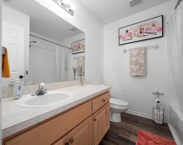 full bathroom with wood-type flooring, vanity, toilet, and shower / bath combo