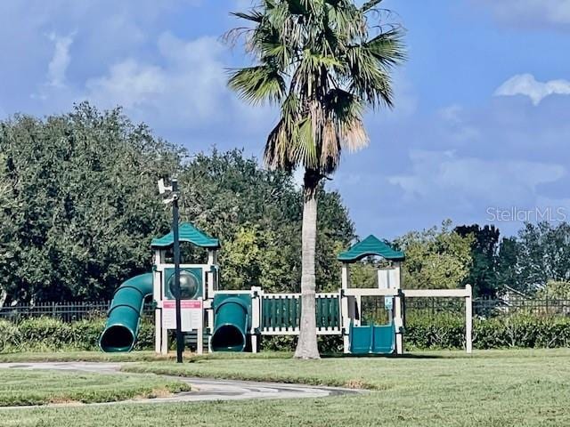 view of playground with a yard