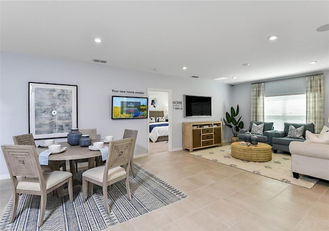 dining room featuring light tile patterned flooring