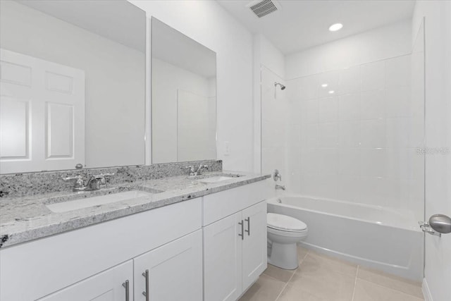 full bathroom featuring toilet, tile patterned flooring, vanity, and tub / shower combination