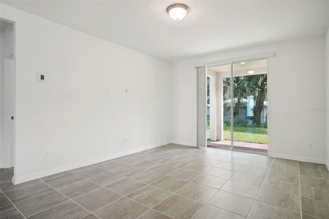 view of tiled spare room