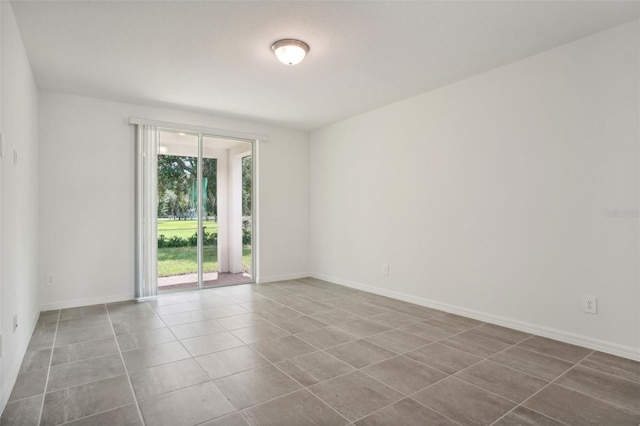 view of tiled spare room