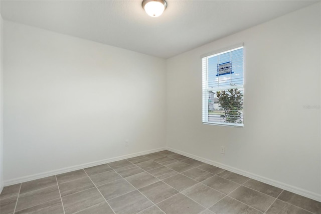 view of tiled spare room