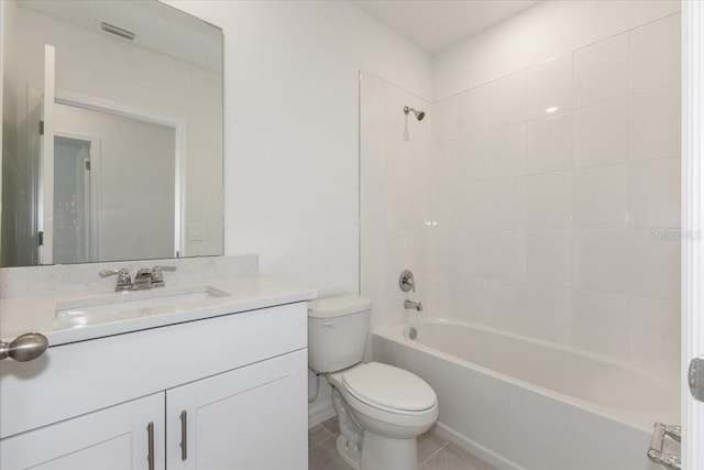 full bathroom featuring tile patterned flooring, shower / washtub combination, vanity, and toilet