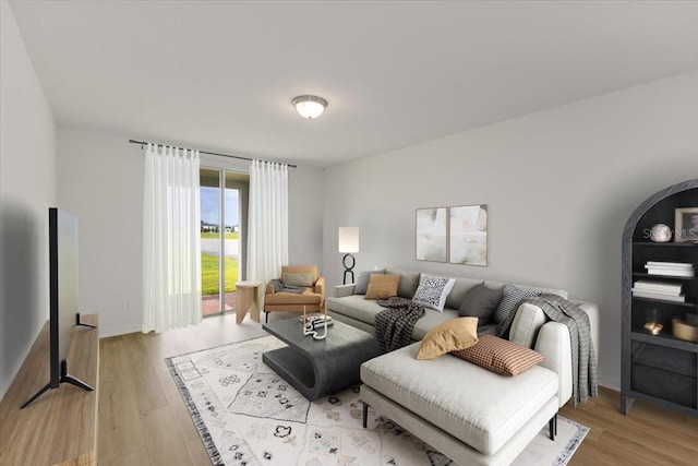 living room with light hardwood / wood-style flooring