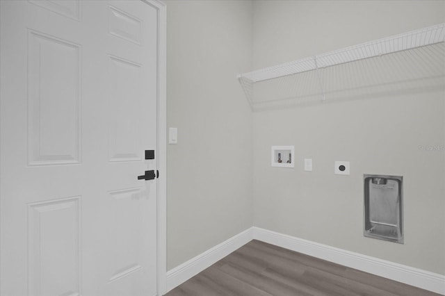 washroom with washer hookup, hookup for an electric dryer, and hardwood / wood-style floors