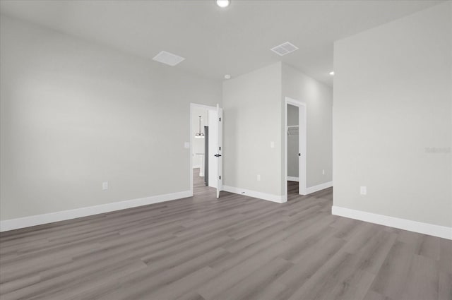 unfurnished room featuring light hardwood / wood-style floors