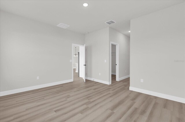 4683 SW 136th St, Ocala, FL 34473 - empty room with light wood-style floors, recessed lighting, and baseboards