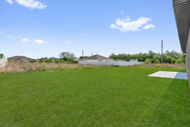 4683 SW 136th St, Ocala, FL 34473 - view of green lawn featuring a patio area
