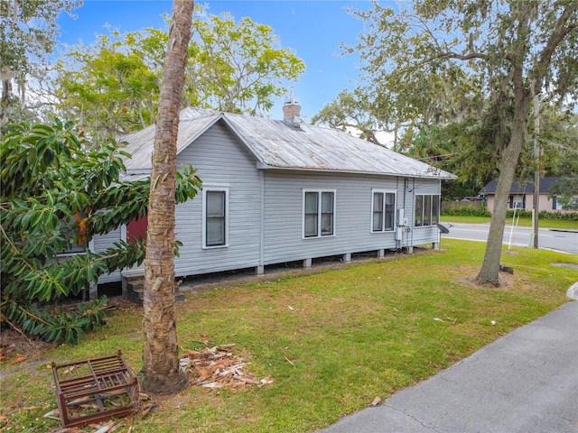 exterior space with a yard