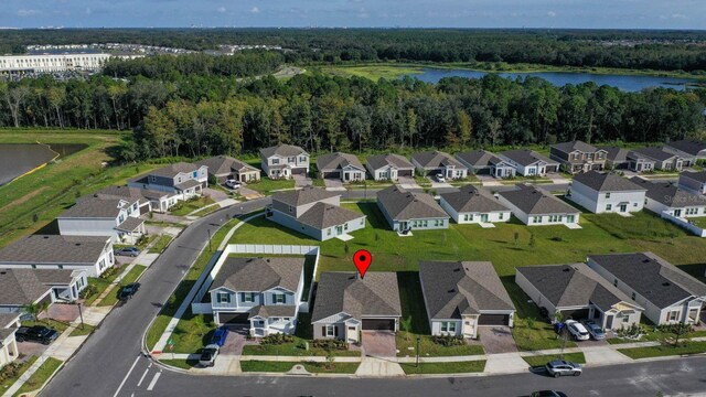 drone / aerial view featuring a water view