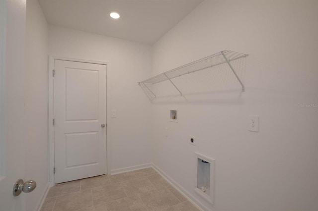 laundry room featuring washer hookup, hookup for an electric dryer, and light tile patterned floors