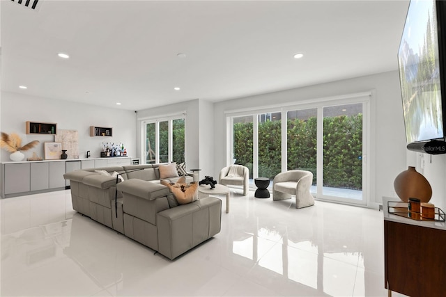 living room with light tile patterned floors