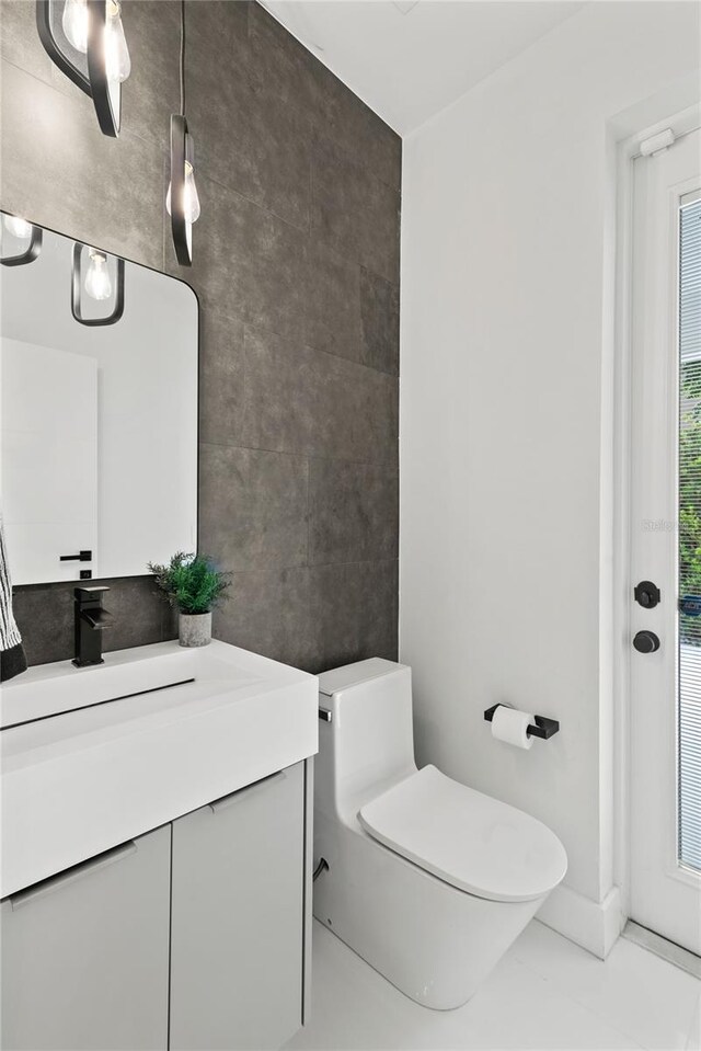 bathroom with vanity and toilet