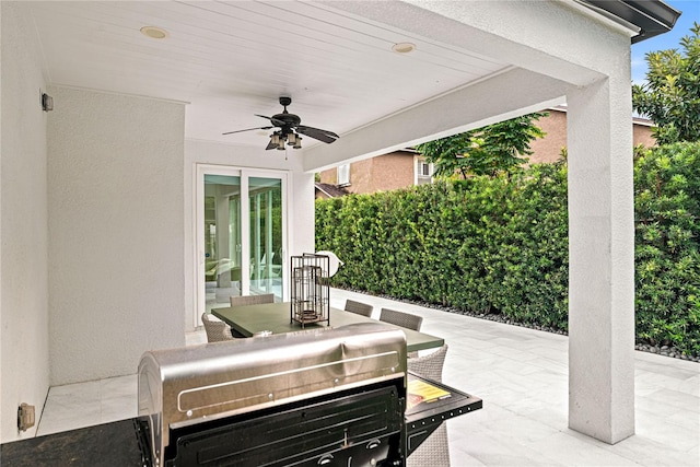 view of patio with ceiling fan